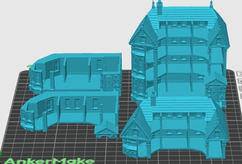Puede incluir: Un modelo azul claro impreso en 3D de un edificio de varios pisos, mostrado en secciones modulares separadas. Las piezas muestran detalles arquitect&oacute;nicos que incluyen ventanas, l&iacute;neas de techo y estructuras de pared sobre una cuadr&iacute;cula digital.