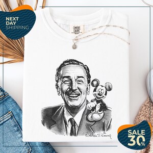 a white t-shirt with a black and white illustration of Walt Disney, holding Mickey Mouse, and a price tag.