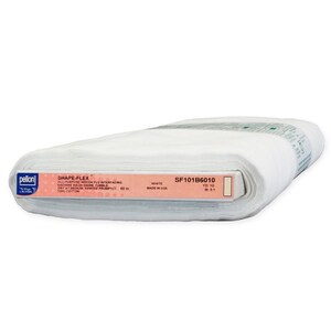 May include: A roll of white Pellon Shape-Flex all-purpose woven fusible interfacing fabric. The label displays the text Pellon, Shape-Flex, SF101B6010, 100% cotton, 60 in, and Made in USA. The fabric is tightly wound into a cylindrical bolt shape.