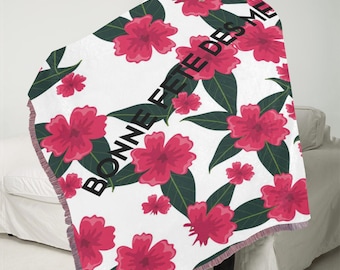 Manta ultrasuave con flecos rosas de 60 x 80 pulgadas.