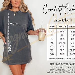 May include: Dark grey unisex Comfort Colors t-shirt with a size chart. The chart shows measurements in inches for sizes S to 4XL. The model is wearing an extra large. The shirt is labeled as 1717 Unisex Tee Shirt.