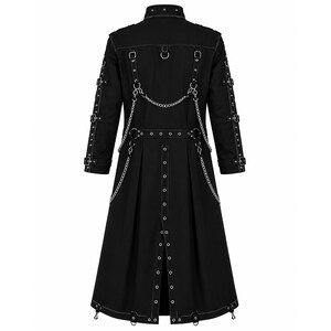 May include: A black long coat featuring a high collar, long sleeves with multiple buckled straps, and silver-toned metal hardware. The back displays decorative silver chains, metal eyelets along the center vent, and adjustable straps.