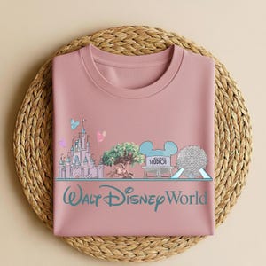 May include: A rustic wooden sign with the text "Welcome to our home" in white lettering. The sign features a distressed finish and a simple, inviting design, perfect for entryway decor.