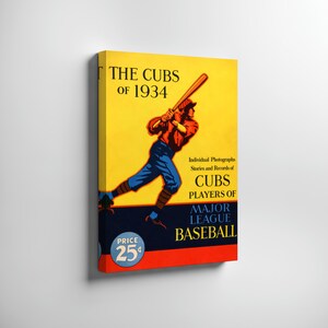 May include: A vintage baseball-themed canvas print featuring a player swinging a bat. The artwork has a yellow background with text that reads "THE CUBS OF 1934." Additional text includes "CUBS PLAYERS OF MAJOR LEAGUE BASEBALL." A price tag reads "25¢."