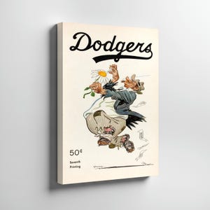 May include: Vintage Dodgers print featuring a cartoon character holding a daisy. The word "Dodgers" is in large black script at the top. The print also includes the price "50¢" and "Seventh Printing". The artwork is on a cream-colored background.