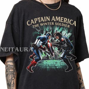 May include: A white ceramic mug with a black handle and the text "But First, Coffee" in a black, bold font. The mug is on a wooden surface.