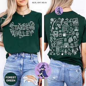 May include: Forest green t-shirt with the words "Stardew Valley" in white script on the front. The back of the shirt features a collection of white line art illustrations. The shirt also has a round purple sticker with a cat wearing a wizard hat.