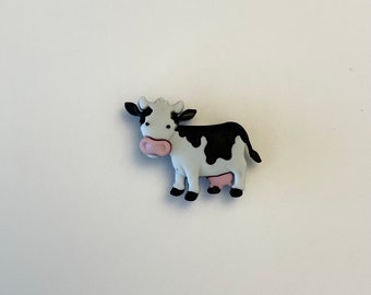 cute black and white cow needle minder for cross stitch, embroidery or quilting, strong magnetic needle holder, needle keeper, needle nanny