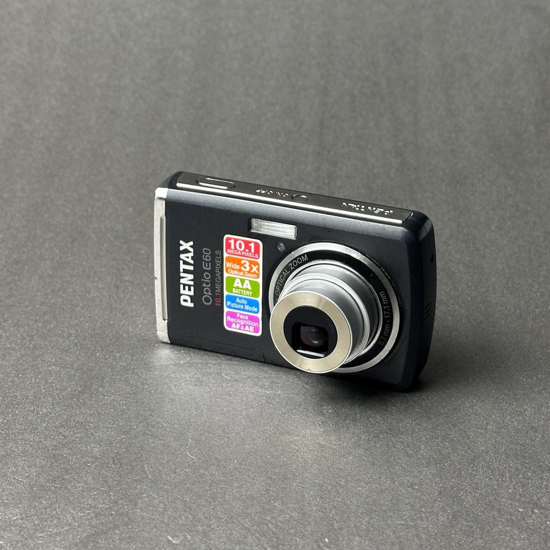 Pentax Optio E60 Digital Camera 10MP Compact Point and Shoot AA