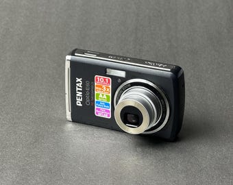 Pentax Optio E60 Digital Camera 10MP Compact Point and Shoot AA