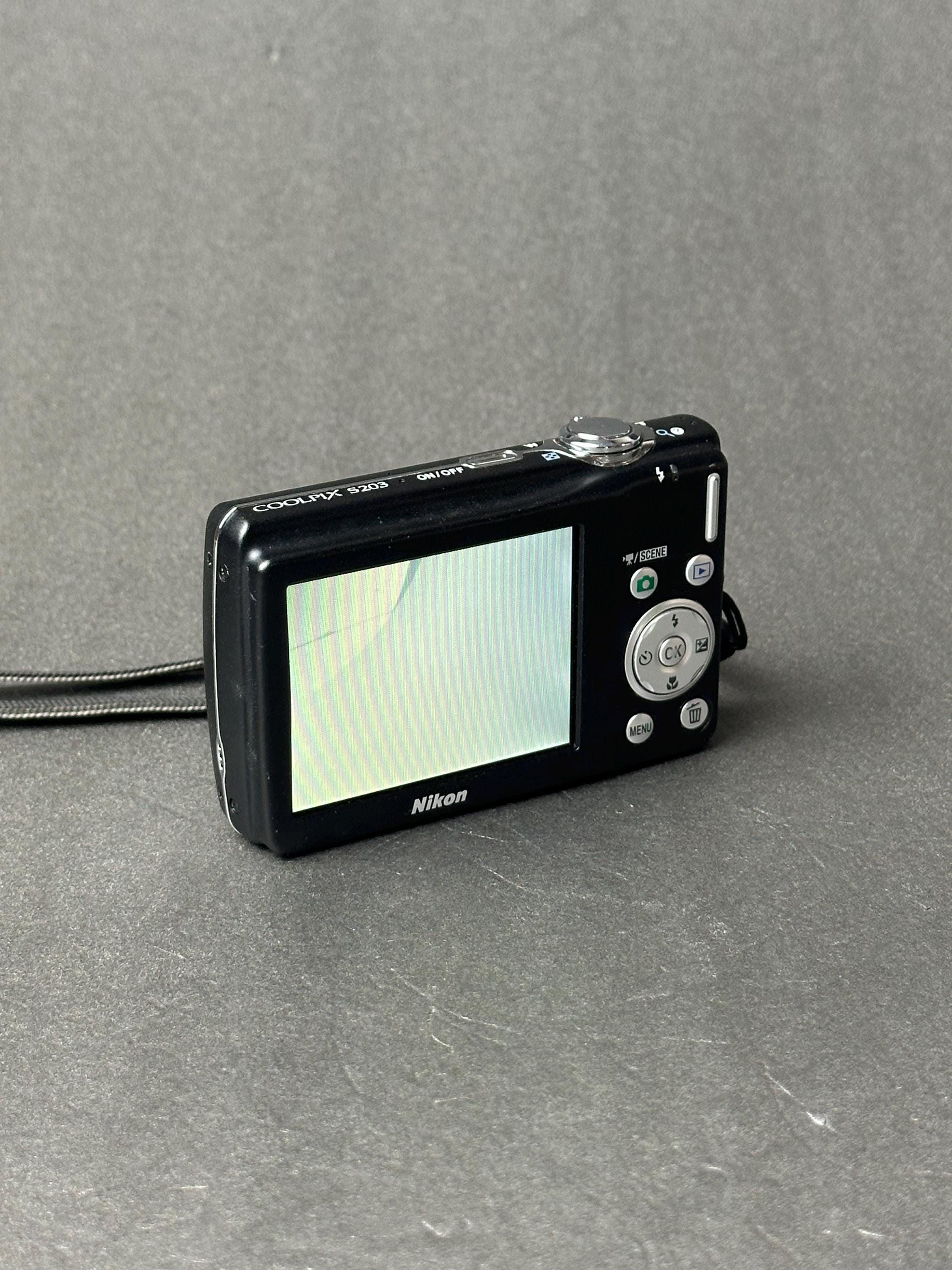Nikon Coolpix S203 Digital Camera Compact CCD Camera Silver Tested Nikon Coolpix S203 Digital Camera Compact CCD Camera Silver Tested