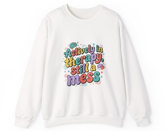 Actively in Therapy Still a Mess Sweatshirt | mental health humor, retro wavy text