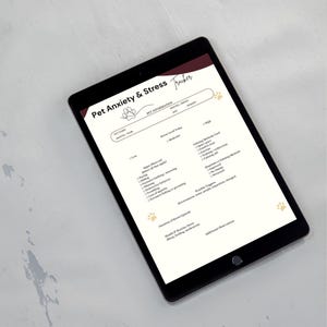 May include: A digital tablet displays a pet anxiety and stress tracker. The document features sections for pet information, stress level, observed signs, calming methods, and triggers. The design includes paw prints and a burgundy header.