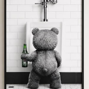 May include: A framed wall art print featuring a gray teddy bear standing at a white porcelain urinal. The bear holds a green glass beer bottle in its right hand. The background consists of white subway tiles and a black and white hexagonal floor.