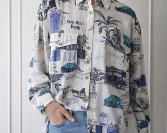 Vintage jaren 90-shirt met kunstprint en knoopsluiting | Safari-krantencollageblouse/groot