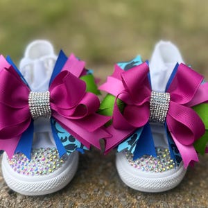 May include: A rustic wooden sign with the text "Welcome to our home" in white lettering. The sign features a distressed finish and a simple, inviting design, perfect for entryway decor.