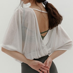 Haut d'entraînement rafraîchissant à dos ouvert pour femme