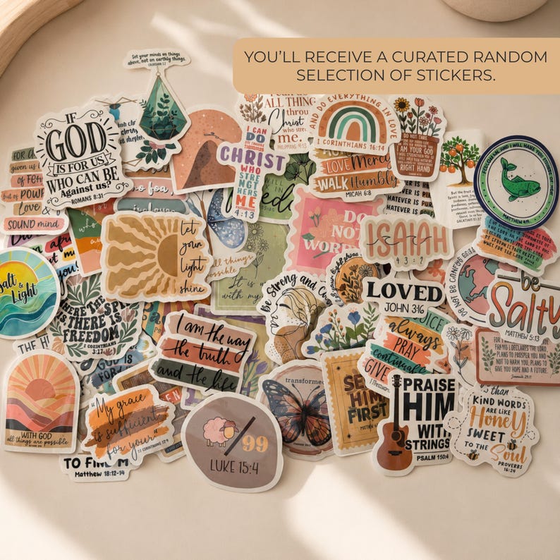May include: A collection of assorted vinyl stickers featuring various religious quotes, floral illustrations, rainbows, and nature motifs. The stickers display text such as If God Is For Us, Let Your Light Shine, and Praise Him With Strings.