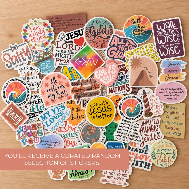May include: A collection of assorted vinyl stickers featuring various Christian-themed quotes, Bible verses, and colorful graphic designs including hearts, rainbows, flowers, and a lighthouse, all arranged in a scattered pile on a wooden surface.