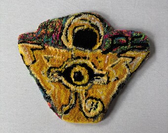Yugioh Tufted Rug, Eye necklace