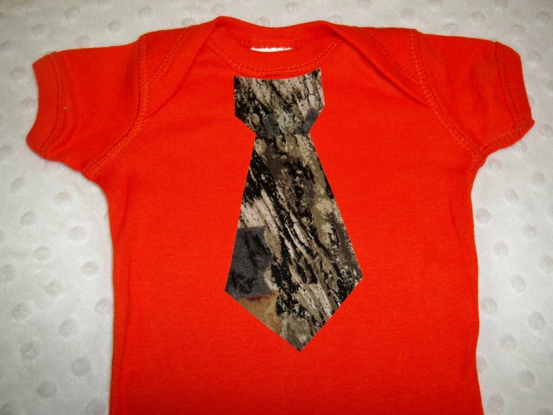 6 Piece Camo Baby Boy Gift Set Orange Bodysuit with Camo Tie Camo Burp Cluth and set of 4 Hunting Bibs Orange and Camo Bodysuit Camo Baby