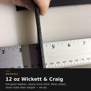May include: A thick black strip of full-grain leather held vertically against a metal ruler. The ruler shows the leather edge aligned near the 4-inch mark. Text below reads: MATERIALS 12 oz Wickett & Craig Full-grain leather, nearly 5mm thick.