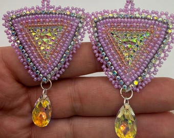 Pink Triangles with Crystals