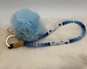 Blue Floral Beaded Wristlet with Blue Pom