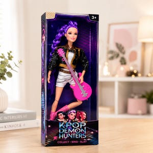 May include: A doll in a box, featuring a doll with purple hair, wearing a black jacket, white shorts, and pink boots, holding a pink guitar. The box has the text "KPOP DEMON HUNTERS" and "COLLECT - SING - SLAY".
