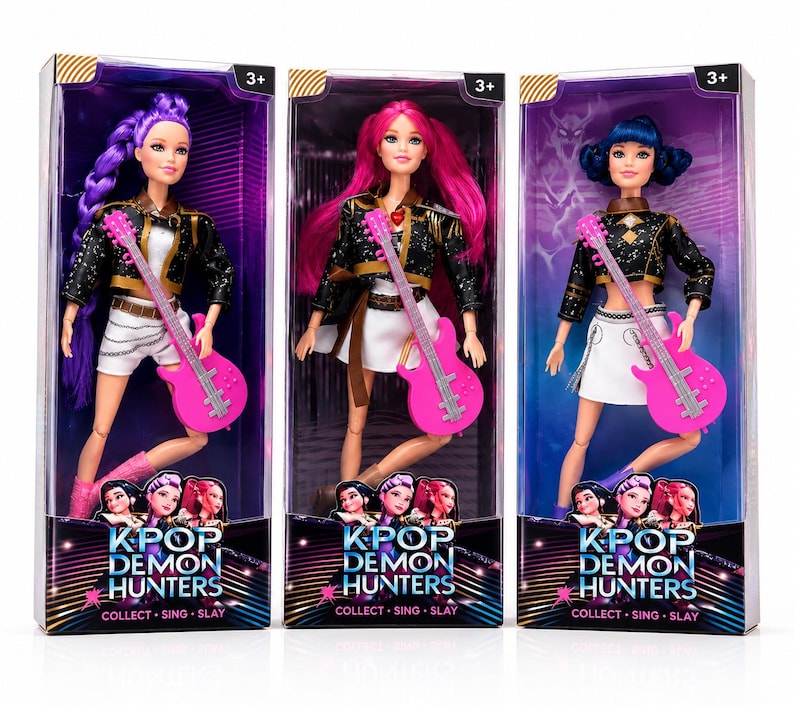 May include: Three K-Pop Demon Hunters dolls in boxes. Each doll has a different hair color: purple, pink, and blue. They wear black and gold jackets, white skirts, and pink boots. Each doll holds a pink guitar. The boxes have the text "KPOP DEMON HUNTERS" and "COLLECT &bull; SING &bull; SLAY."