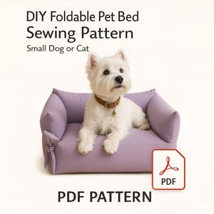 May include: A DIY foldable pet bed sewing pattern for a small dog or cat, featuring a white West Highland Terrier sitting in a lavender-colored fabric pet bed with side ties. The text reads DIY Foldable Pet Bed Sewing Pattern, Small Dog or Cat, PDF PATTERN.