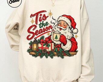 ホリデーシーズンのサンタスウェットシャツ、レトロなクリスマスクルーネック、ヴィンテージサンタホットココアセーター、快適なホリデーグラフィックプルオーバー、クリスマスギフト