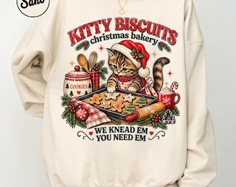 キティビスケットのクリスマススウェットシャツ、レトロなベーキングキャットクルーネック、「私たちはこねて、あなたはそれを必要とする」、ヴィンテージクリスマス クッキー セーター、猫好きへのギフト