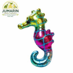 May include: A plush seahorse toy in vibrant colors. The toy features a gradient of yellow, green, pink, and blue with a grid pattern. The seahorse has a black eye and a curved tail. The logo "JUMARIN - WORLD ANIMALS" is in the upper left corner.