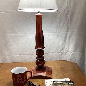 Turned wooden lamp