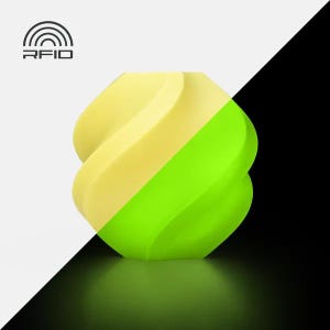 Pode incluir: Escultura abstrata de duas cores com um design em espiral. A metade superior &eacute; amarelo p&aacute;lido, enquanto a metade inferior &eacute; verde brilhante. O fundo &eacute; preto e branco, com o texto "RFID" acima.