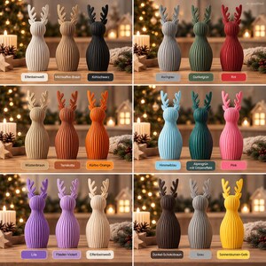 May include: A collection of eighteen vertical, ribbed, deer-shaped figurines with antlers, displayed in various colors including white, brown, black, gray, green, red, orange, blue, pink, purple, and yellow, each labeled with its specific color name.