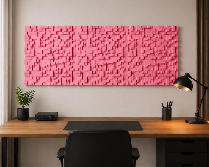 May include: A large rectangular wall art piece composed of numerous small, protruding pink wooden blocks of varying heights and widths, creating a textured, three-dimensional surface mounted horizontally on a plain wall.