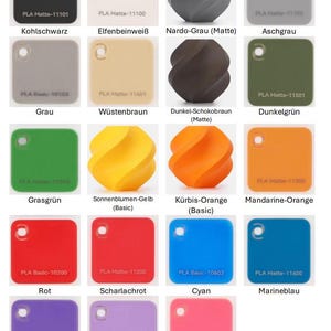 May include: A selection of 18 colour swatches, each with a unique hue and name. Colours range from black, white, and grey to vibrant shades of red, blue, and green. Some swatches feature a 3D-printed spiral design. Text labels identify each colour.
