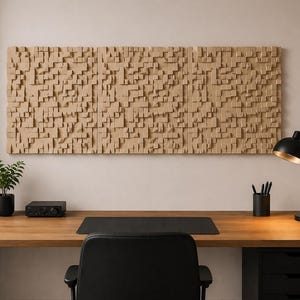 May include: A large rectangular wall-mounted acoustic panel composed of numerous small, light brown wooden blocks of varying heights and depths, creating a textured, three-dimensional grid pattern across the entire surface.