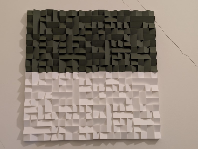 May include: A square wall art piece featuring a three-dimensional geometric design made of folded paper. The top half consists of dark olive green paper segments, while the bottom half is composed of white paper segments, creating a high-contrast look.