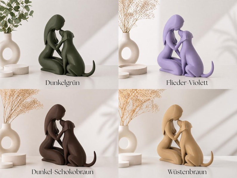 May include: A set of four monochromatic sculptures depicting a person kneeling and embracing a dog. The figures are available in dark green, lilac, dark chocolate brown, and desert tan. Each sculpture is labeled with its color name in German.