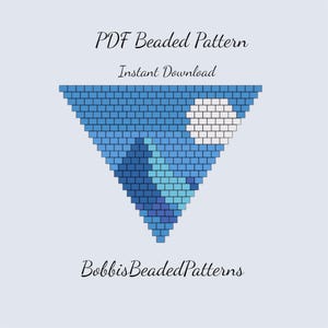 May include: A PDF beaded pattern titled PDF Beaded Pattern Instant Download by BobbisBeadedPatterns. The design is a downward-pointing triangle composed of blue, light blue, and white square beads, forming a mountain landscape with a moon.