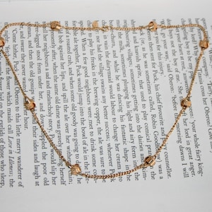 Avon Gold Tone Knot Necklace - &quot;Delicate Knot&quot; 1977 Minimalist Simple Chain Link Necklace Manrope Knot