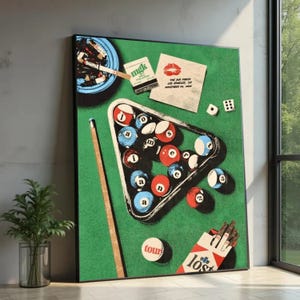 May include: A framed print depicting a pool table scene with a green felt backdrop. The image includes a triangle of billiard balls, a cue, a cigarette packet, dice, and a blue ashtray. Text includes "mgk" and "tour".
