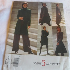 May include: A sewing pattern booklet with the title "Vogue 5 Easy Pieces" and the pattern number 1471. The booklet features four different fashion illustrations of women wearing coats and dresses.