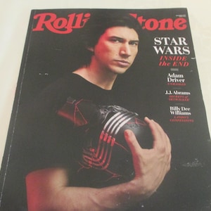 May include: A magazine cover featuring Adam Driver, the actor who plays Kylo Ren in the Star Wars sequel trilogy. The cover features the title "Rolling Stone" and the text "Star Wars Inside the End".