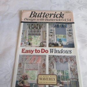 May include: A Butterick 6434 sewing pattern envelope titled Easy to Do Windows. The front features four color photographs of various window treatments, including valances and curtains, with the text At Home With Waverly Easy to Do Patterns.