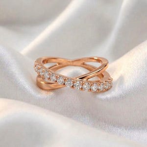 May include: A set of three ceramic mugs with a speckled, matte finish. The mugs are in shades of cream, light gray, and dark gray. Each mug has a simple, minimalist design, perfect for coffee or tea.