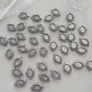 Cadrans de montre ovales argentés en vrac, assortiment de têtes de montre à quartz vintage avec cadran blanc, pièces de mouvement de montre pour la fabrication de bijoux à monter soi-même, cadran de montre en gros